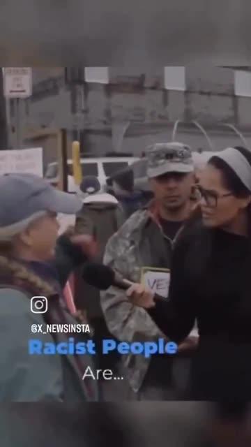 Racist liberal anti-ICE protester profiles a reporter because of her brown skin tone