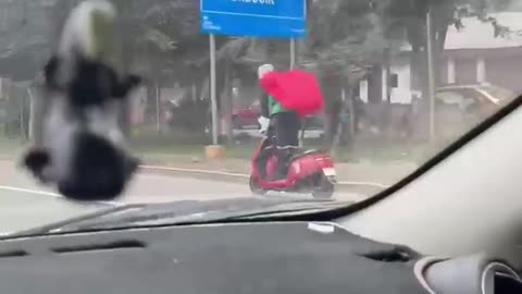 The Great Saiyaman Spotted Riding a Scooter in Peru