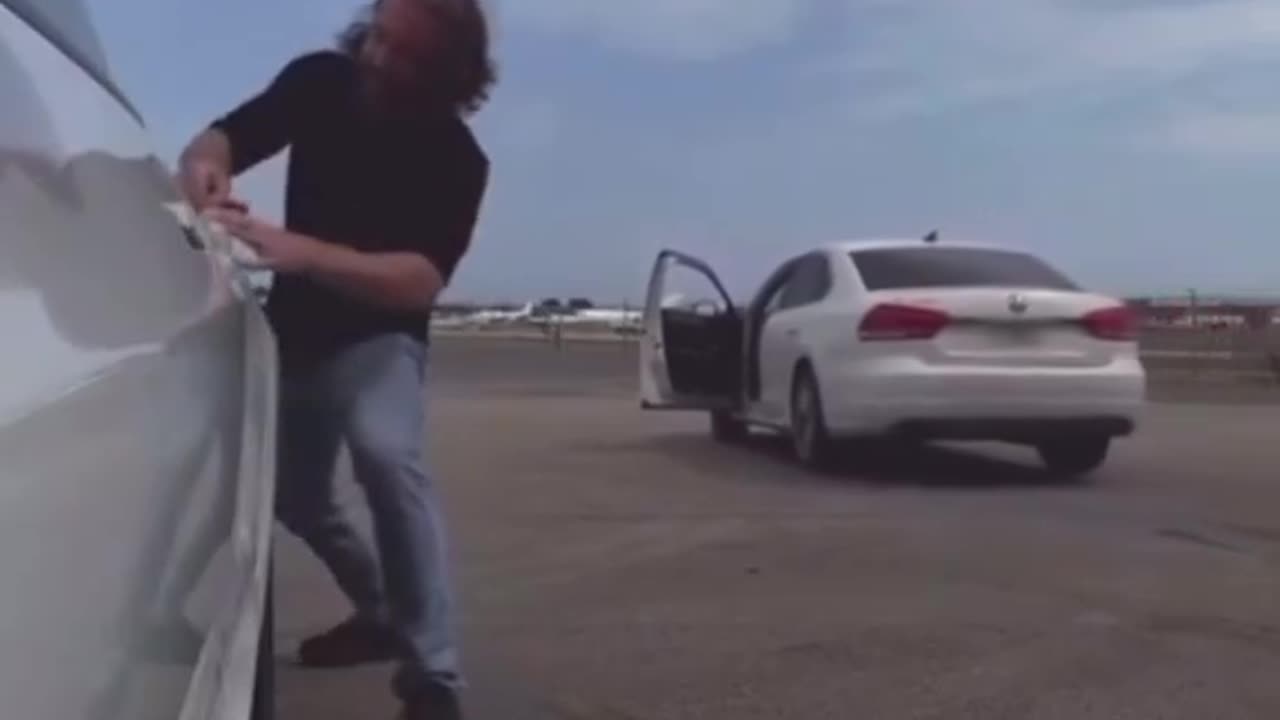 Dumbass Liberal loses Car as he decides to hump, scratch his butt on and Vandalize a Tesla