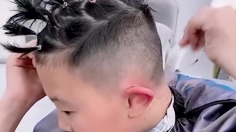This kid cuts his own hair!.hd