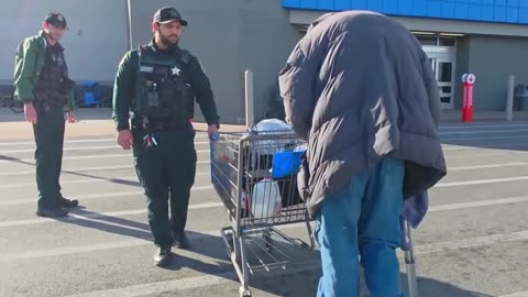 Officers Help Allegedly Blind Man Walking with Crutches