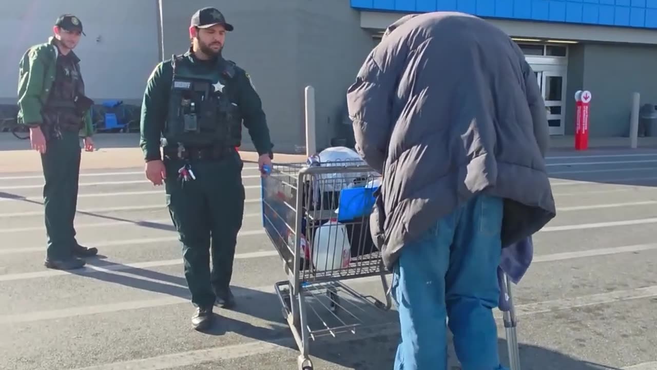 Officers Help Allegedly Blind Man Walking with Crutches
