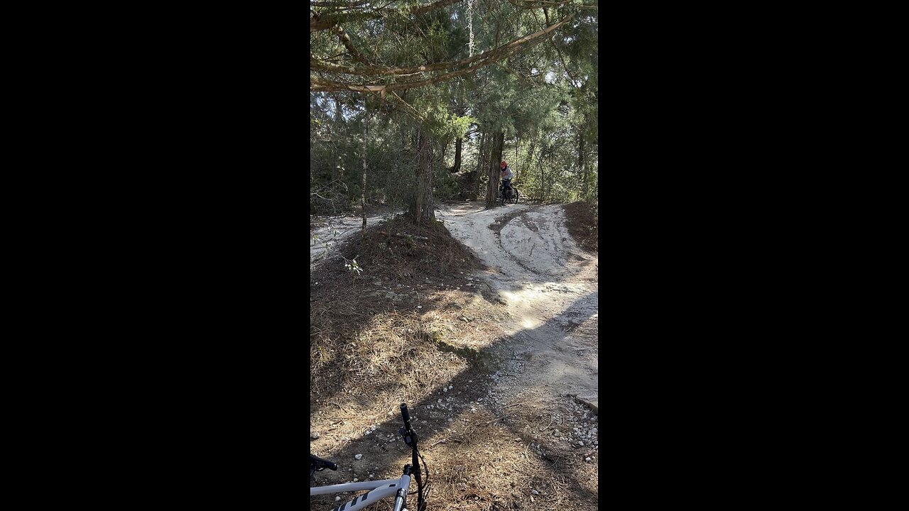 Kaleb nailing the drop at Santos on my bike