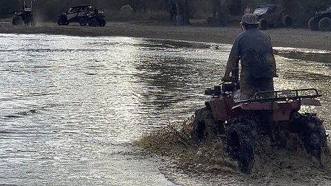 Mudaholic 2025 Layton playing in water
