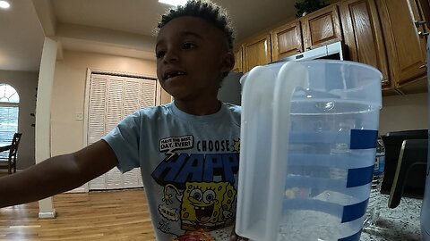 Asher makes kool aid