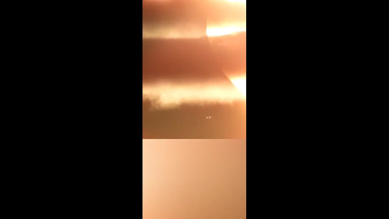 ufo flies up and past sun