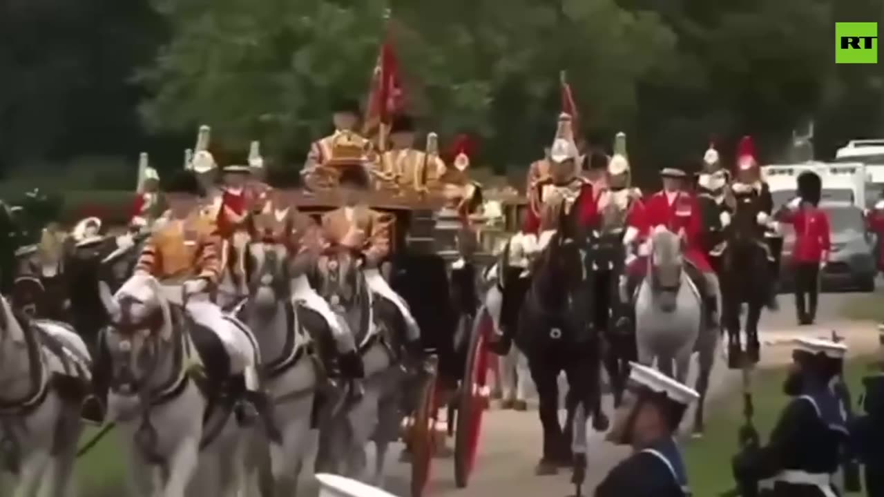 Trump — in a carriage alongside King Charles