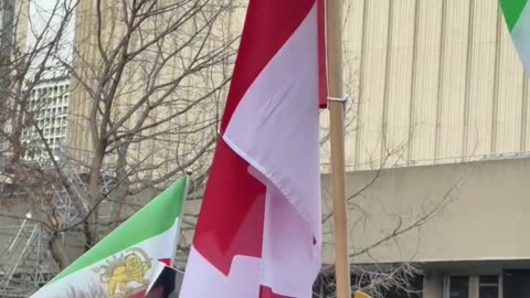 Canadian Flag Seen At Free Iran Protests in Toronto