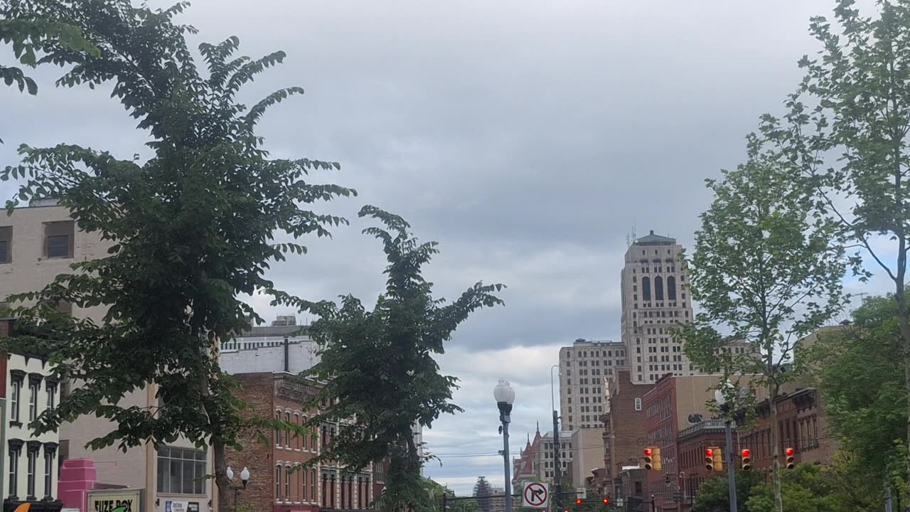 "Clouds" blocking the direct light from the white sun(blue hue) and yellow sun(2)