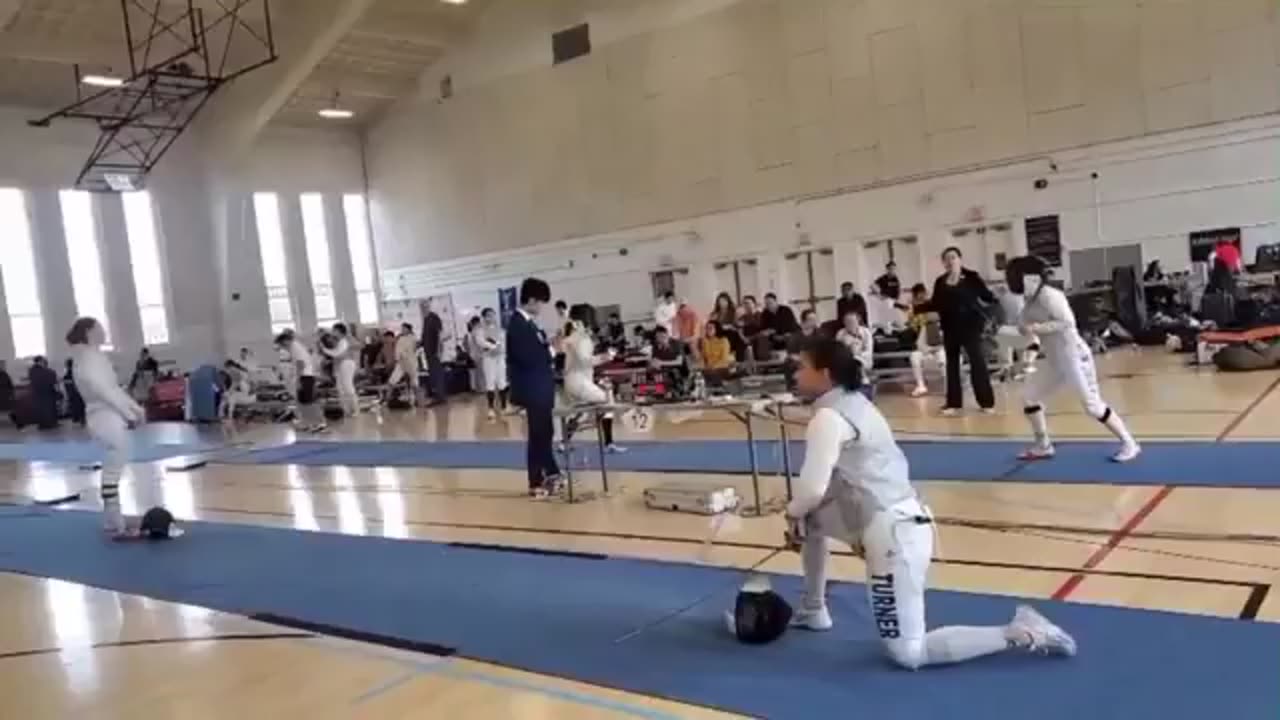 Female fencer takes knee instead of competing against biological male