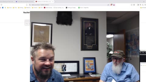 Koulie Kyle and Richard Haskell studying the book of Romans