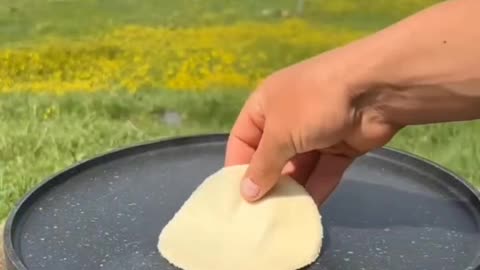Cooking taco with shrimp in nature