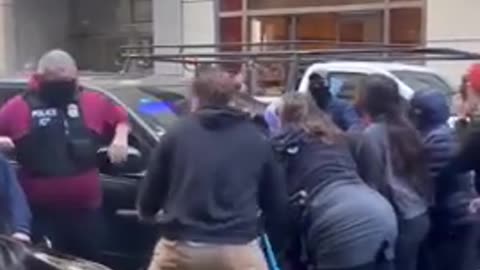 Tense confrontation outside San Francisco's immigration courthouse on Tuesday.