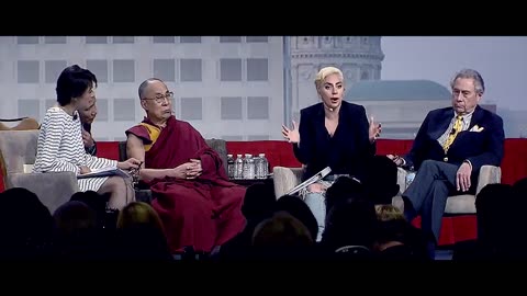 Lady Gaga describes how the evils divide us into small groups so we hate one another