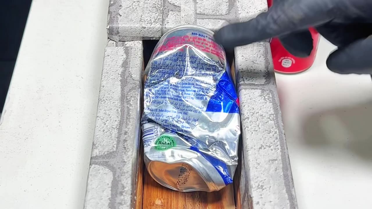 Redbull vs Coke can crushing challenge