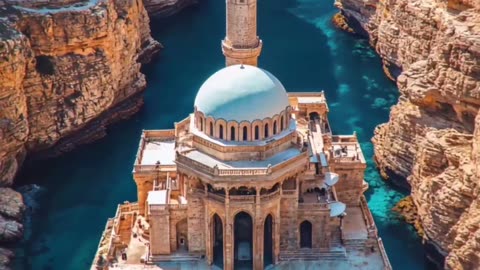A Mosque Rising From The Water