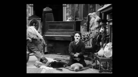 Charkie Chaplin Charlie Chaplin's "Behind The Screen"1916