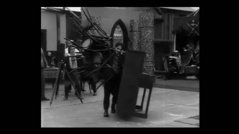 Charkie Chaplin Charlie Chaplin's "Behind The Screen"1916
