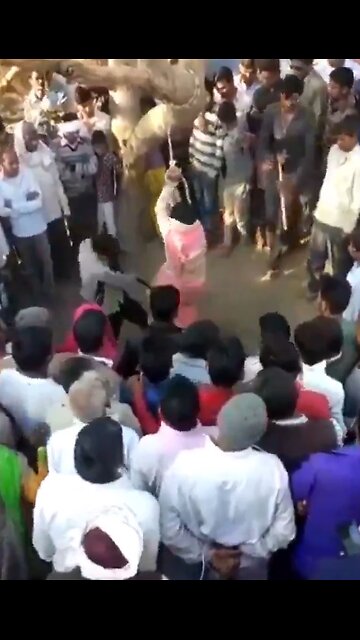 Islamic man beats his wife in public for disrespecting him. Sharia Law