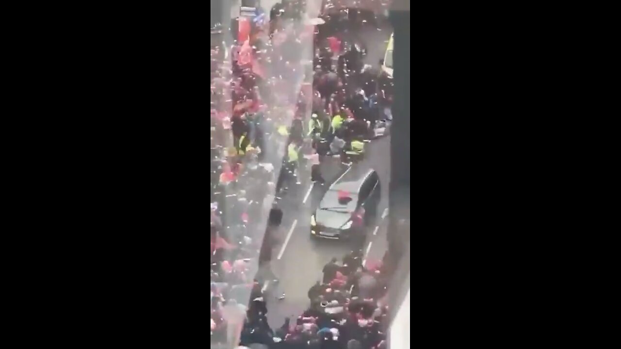 NOW - Car plows into crowd during Liverpool victory parade.
