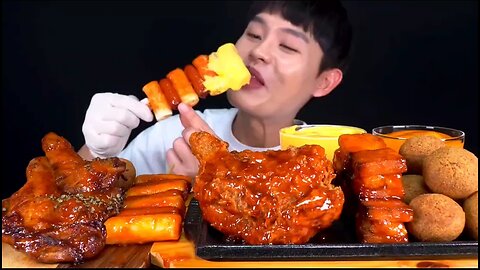Spicy fried chicken legs, cheese topokki, cheese ball, luncheon Meat