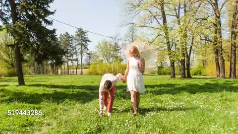 Couple Walking Through Flowers