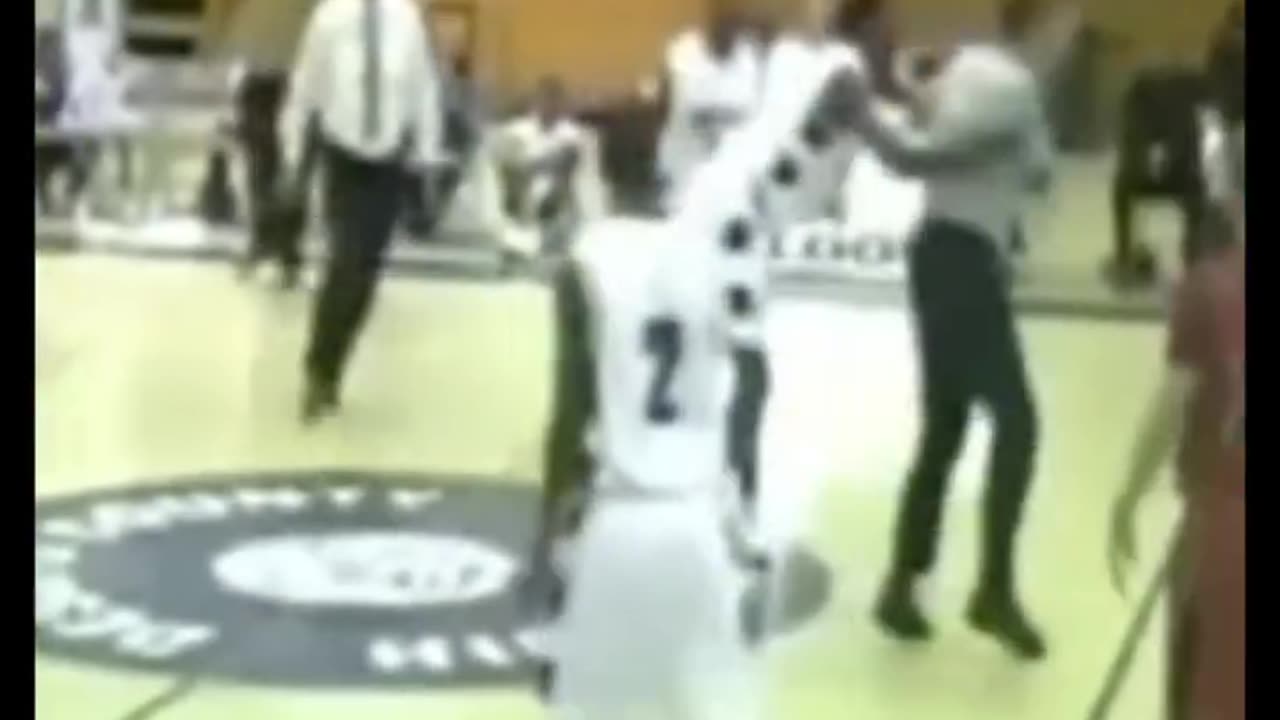 Black attacks White referee