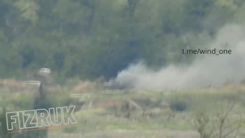 The shooting of a Ukrainian armored personnel carrier from an ATGM