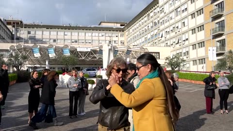 Tango dancers swirl in tribute to Pope Francis outside his hospital