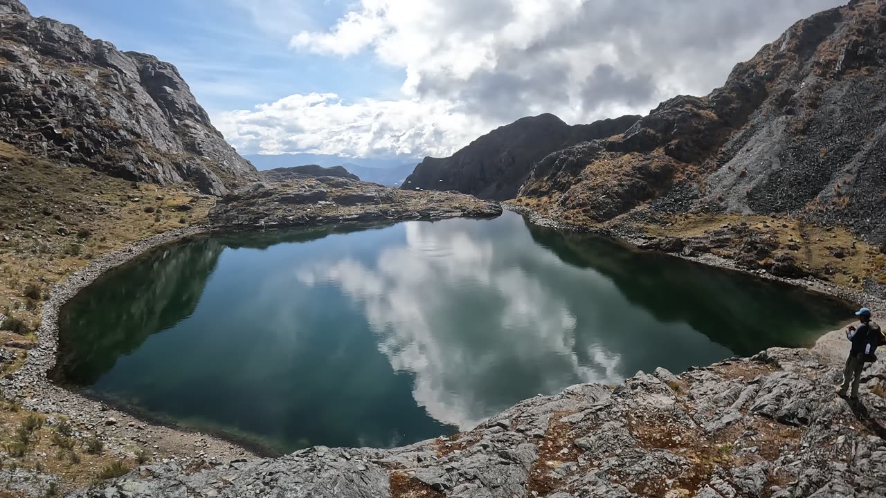 Birds flying above a mountain lake #peace
