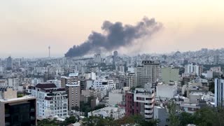 Smoke rises over Tehran after Israeli strike hits state broadcaster