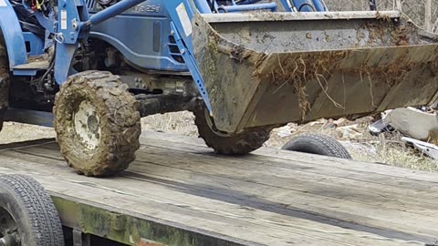 10-Year-Old Daughter Loading Tractor for Dad