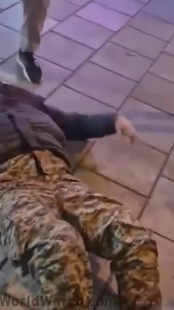 Iranian regime’s security officer jumped by mob of protestors