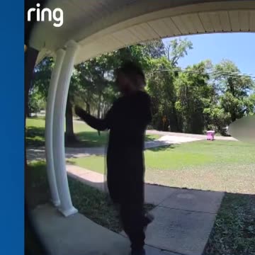 Black with knife at woman's door