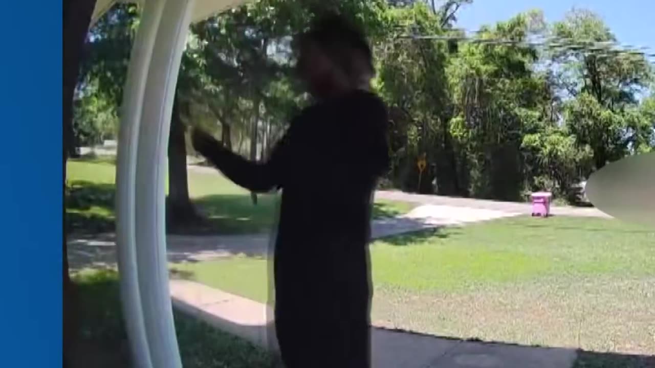 Black with knife at woman's door