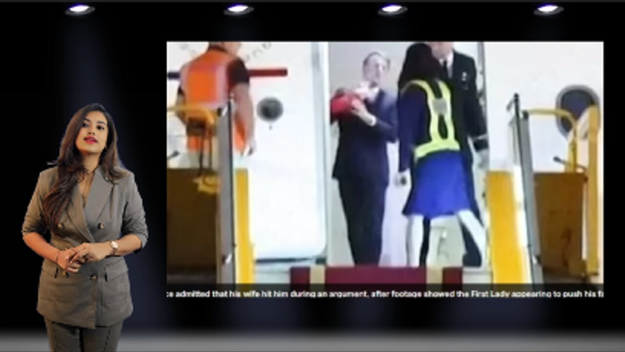 Moment Emmanuel Macron appears to be pushed in the face by his wife