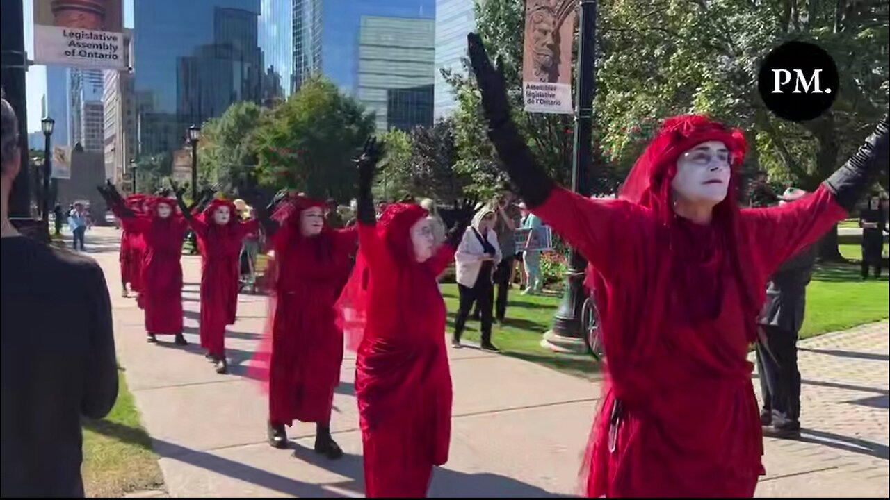 NOW - Climate cultists perform bizarre ritual in Toronto, Canada.