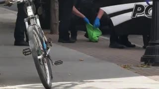 Arrest of man with a rifle nearby in Kirk Assassination