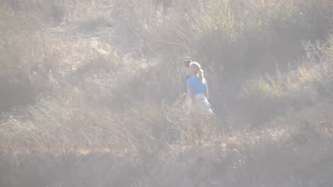 Homeless schizo chases runner at California park.