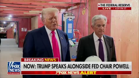 Donald Trump speaks alongside Fed Chair