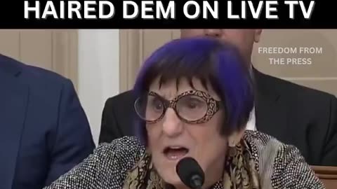 How did this blue haired peacock head get into congress