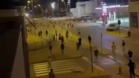 Hundreds of armed migrants are attacking Spaniards.