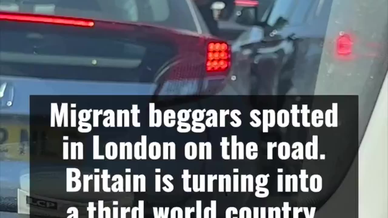 Locals spot migrant beggars on the road in North London.