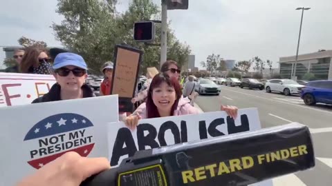 "Retard Finder" device at anti-Elon Musk rally