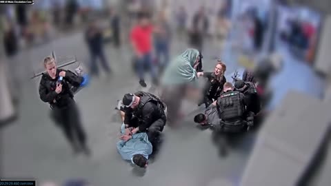 Bodycam footage of alleged assault on police at Manchester Airport shown to jury