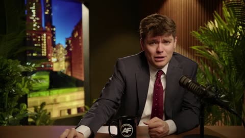 Nick Fuentes talks to a black groyper