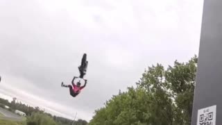 German motocross star Luc Ackermann lands insane backflip between two moving trucks