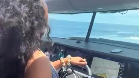 Meg Thee Stallion in the boat with Klay Thompson