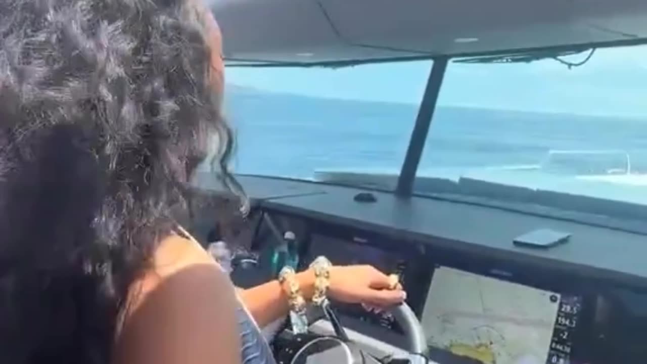 Meg Thee Stallion in the boat with Klay Thompson