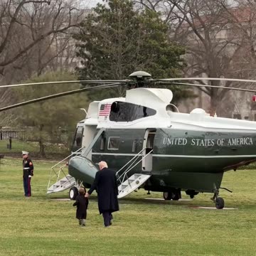 President Trump walks to Marine One with Little X